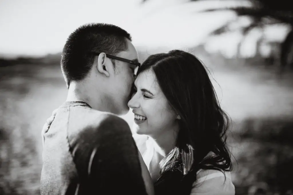 Black and white photo of a couple laughing