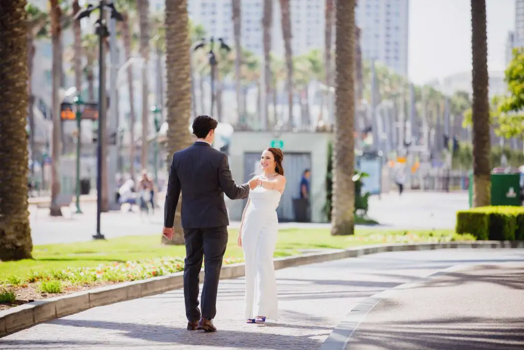 Wedding couple dancing in the street in San Diego