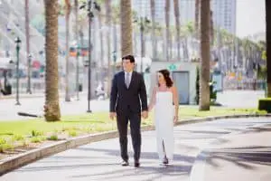 Alli and Jason being photographed in Downtown San Diego on their wedding day